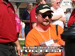 Tugfest Organizer Steve Briggs posting info sheets.
